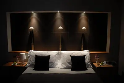 Letto o letti in una camera di B&B Habita
