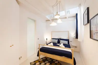 Letto o letti in una camera di Cavour16 Suite