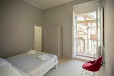 Letto o letti in una camera di Ortigia Casa Fab