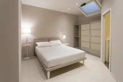 Letto o letti in una camera di Ortigia Casa Fab