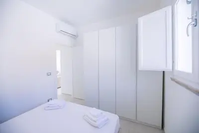 Letto o letti in una camera di Total White Villa