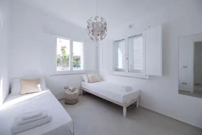 Letto o letti in una camera di Total White Villa