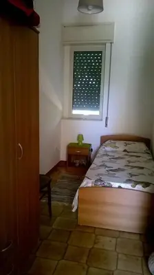 Letto o letti in una camera di Casa Monika