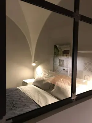 Letto o letti in una camera di PAPALI loft