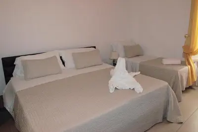 Letto o letti in una camera di La Corte Di Ibla