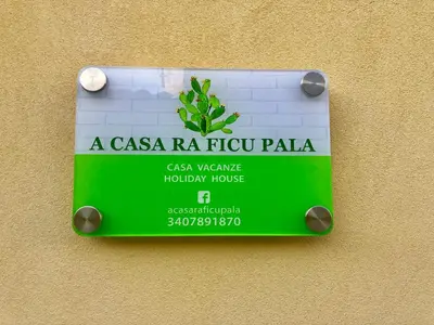 Certificato, attestato, insegna o altro documento esposto da Ficu Pala Holiday Home