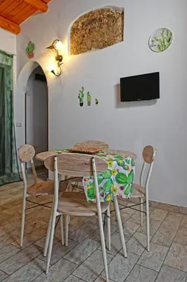 TV o dispositivi per l'intrattenimento presso Ficu Pala Holiday Home