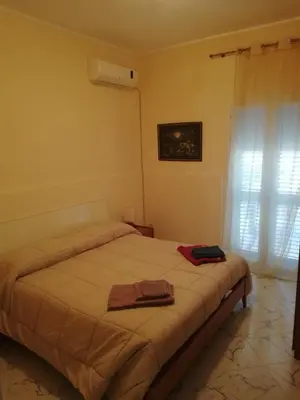 Letto o letti in una camera di Villa Gallina