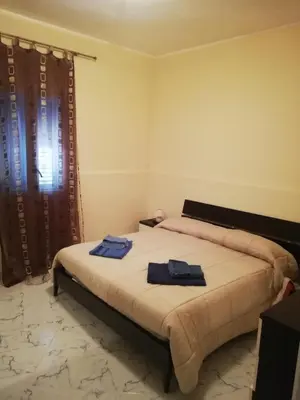 Letto o letti in una camera di Villa Gallina