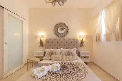 Letto o letti in una camera di QuattroCuori Boutique Hotel & Spa