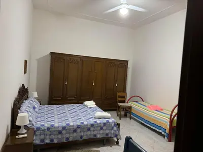 Letto o letti in una camera di via marchesi Avola (sr)