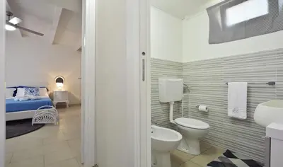 Letto o letti in una camera di CASA con ACCESSO AL MARE