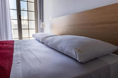 Letto o letti in una camera di Porta Reale Beach Apartment