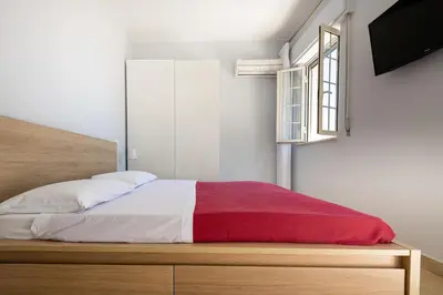 Letto o letti in una camera di Porta Reale Beach Apartment