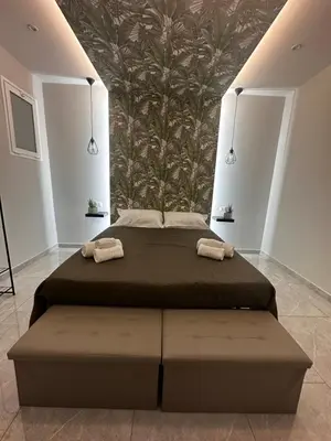 Letto o letti in una camera di Dimora Vittorio Emanuele 392