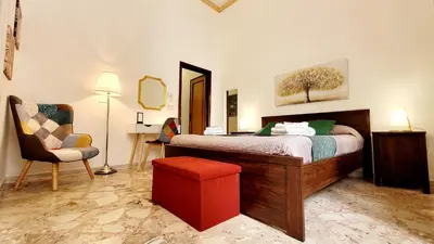 Letto o letti in una camera di Zanzi 's Charming Rooms