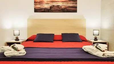 Letto o letti in una camera di Zanzi 's Charming Rooms