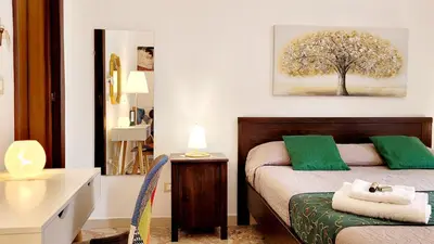 Letto o letti in una camera di Zanzi 's Charming Rooms