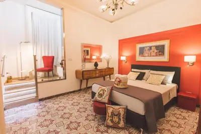 Letto o letti in una camera di Le muse di Apollo
