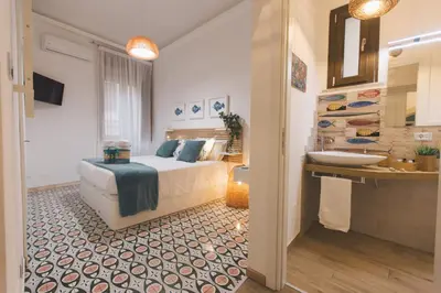 Letto o letti in una camera di Le muse di Apollo