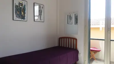 Letto o letti in una camera di Splendido Appartamento 50mt dal mare