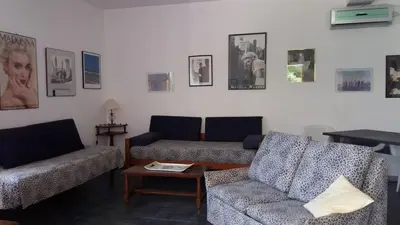 Area soggiorno di Appartamento in villa a Fontane Bianche