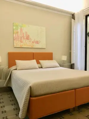 Letto o letti in una camera di Sangiuliano114 B&B