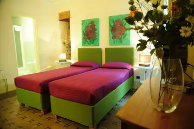 Letto o letti in una camera di Sangiuliano114 B&B