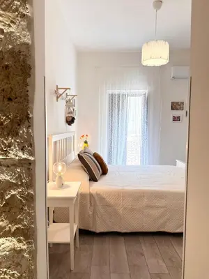 Letto o letti in una camera di Lilly's Home