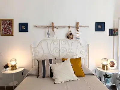 Letto o letti in una camera di Lilly's Home