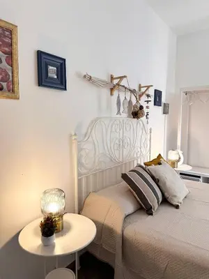 Letto o letti in una camera di Lilly's Home