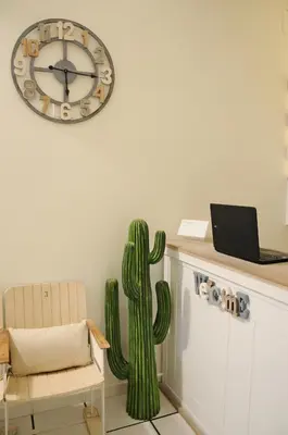 TV o dispositivi per l'intrattenimento presso Thalìa Guest House Marzamemi