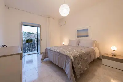 Letto o letti in una camera di Mimma holiday house