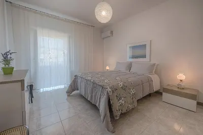 Letto o letti in una camera di Mimma holiday house