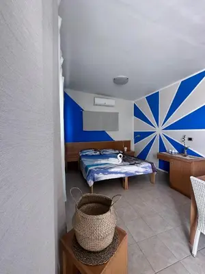 Letto o letti in una camera di Villaggio Albergo Internazionale La Plaja