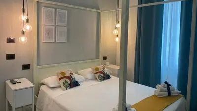 Letto o letti in una camera di B&b Spigolehouse
