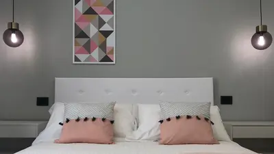 Letto o letti in una camera di B&b Spigolehouse