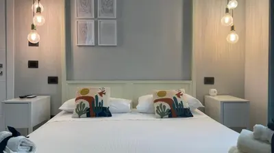 Letto o letti in una camera di B&b Spigolehouse