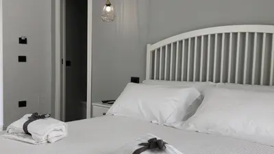 Letto o letti in una camera di B&b Spigolehouse