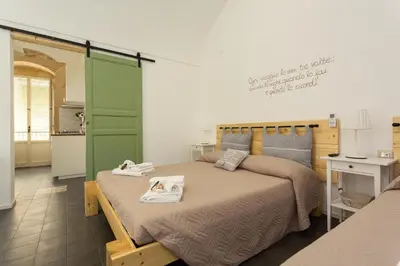 Letto o letti in una camera di Pura Vida Barocca