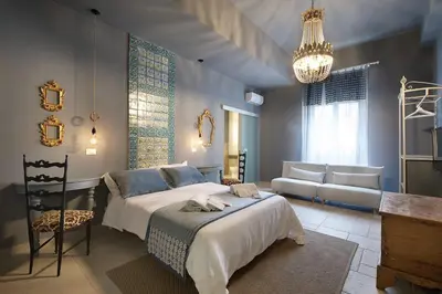 Letto o letti in una camera di Sikuli e Sikani