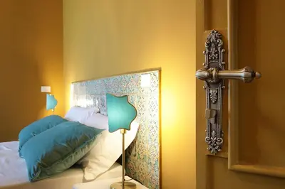 Letto o letti in una camera di Sikuli e Sikani