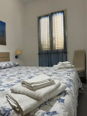 Letto o letti in una camera di Casa Vacanze Il Borghetto