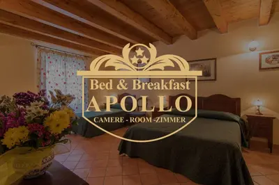 Letto o letti in una camera di Apollo B&B