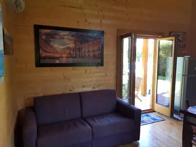 Area soggiorno di Depandance con Piscina e Jacuzzi