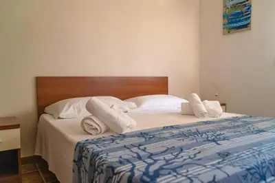 Letto o letti in una camera di Agua Residence