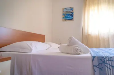Letto o letti in una camera di Agua Residence