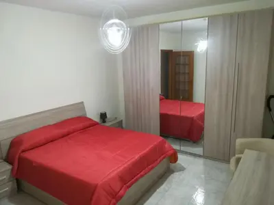 Letto o letti in una camera di La casa di Eva
