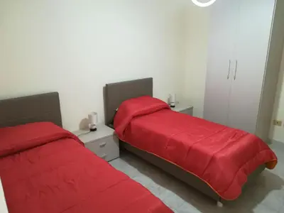 Letto o letti in una camera di La casa di Eva