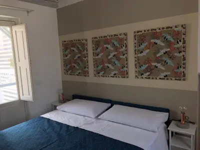Letto o letti in una camera di La volta d'oriente